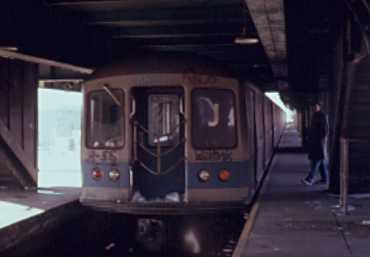[The J train in the station]
